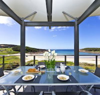 Sails on the Beachfront Exclusive Seaside Home