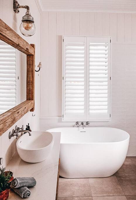 BAY PROPERTIES . Beach House Yamba - Accommodation ACT 2